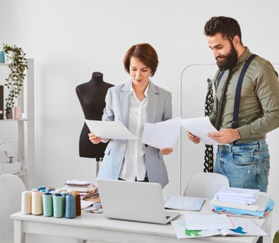 two-fashion-designers-working-new-clothing-line-atelier_23-2148846774